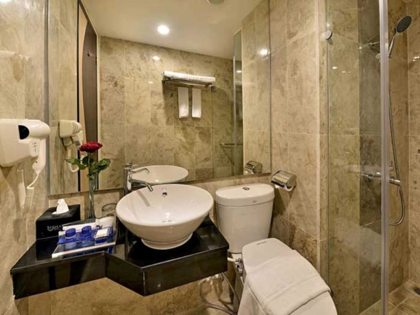 Imagen de la habitación del Hotel Serela Waringin. Foto 11