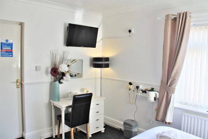 Imagen de la habitación del Hotel Serena Court. Foto 10