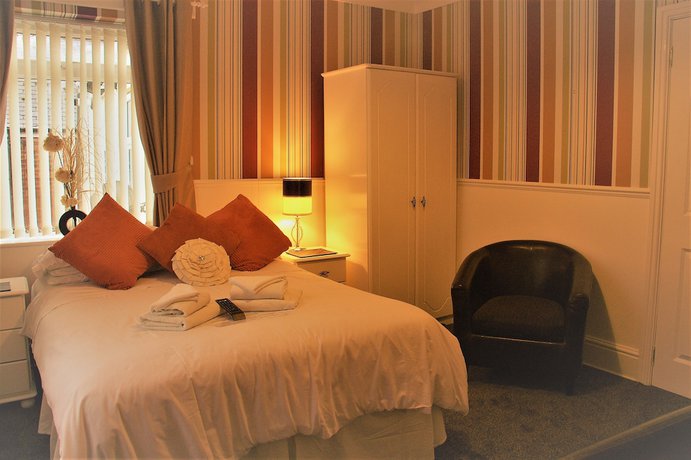 Imagen de la habitación del Hotel Serena Court. Foto 16