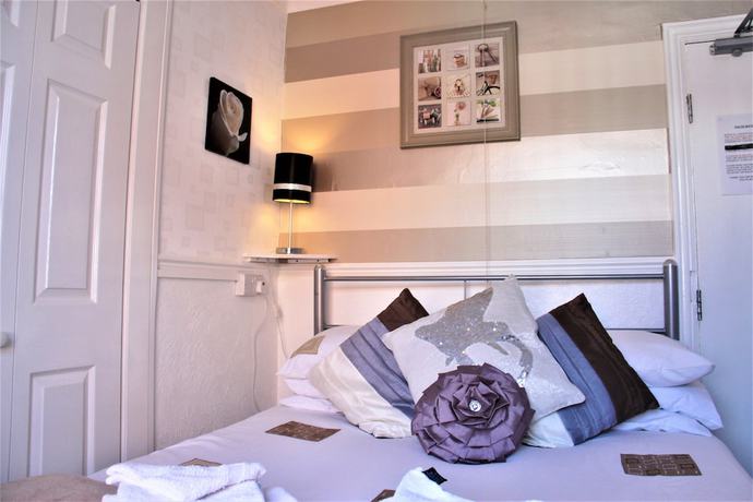 Imagen de la habitación del Hotel Serena Court. Foto 18
