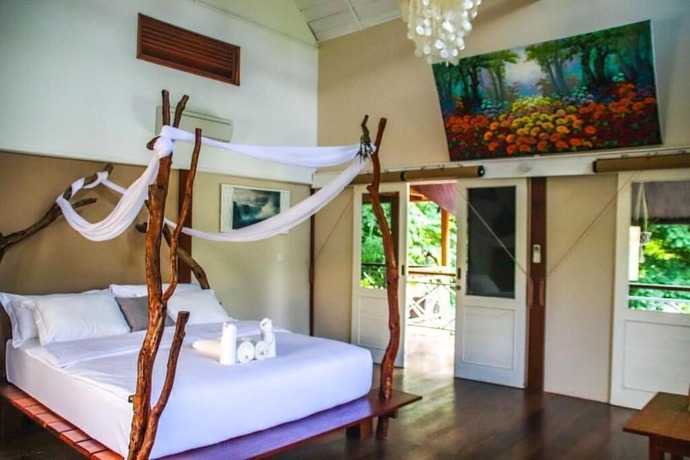 Imagen de la habitación del Hotel Serene Beach Villa. Foto 11