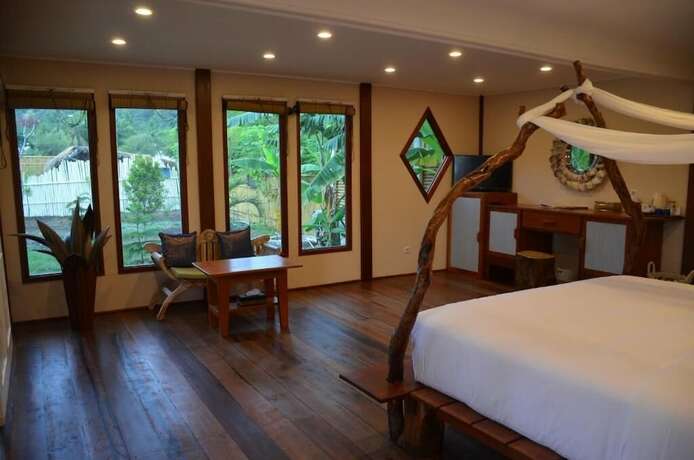 Imagen de la habitación del Hotel Serene Beach Villa. Foto 12
