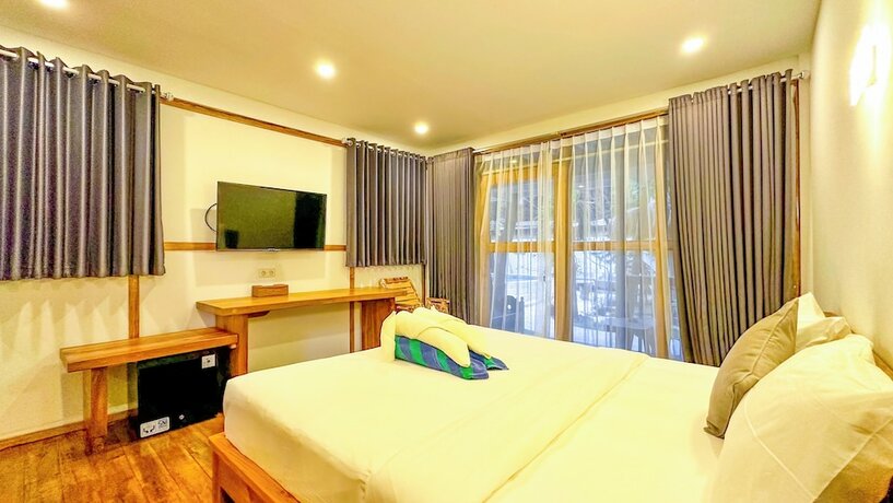 Imagen de la habitación del Hotel Serene Beach Villa. Foto 13
