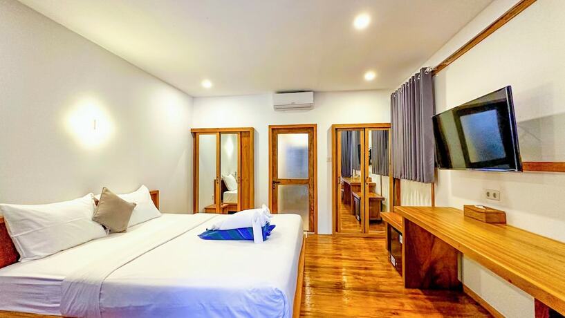 Imagen de la habitación del Hotel Serene Beach Villa. Foto 14