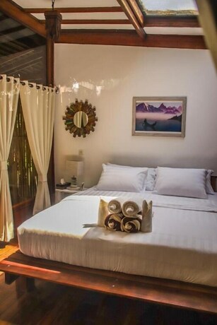 Imagen de la habitación del Hotel Serene Beach Villa. Foto 17