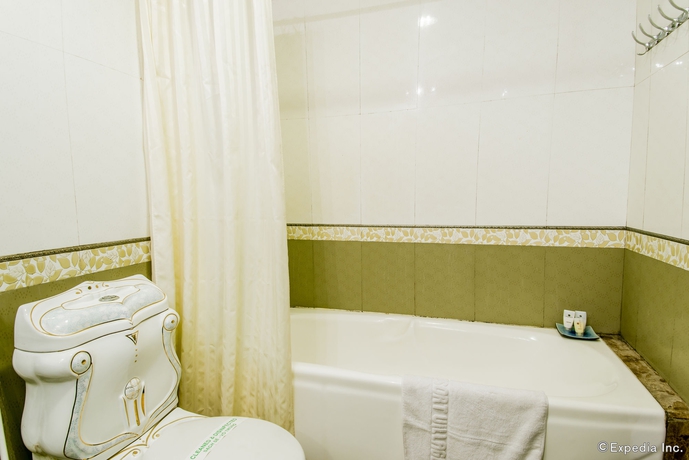 Imagen de la habitación del Hotel Serene Central. Foto 3