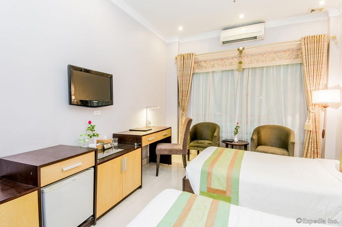 Imagen de la habitación del Hotel Serene Central. Foto 4