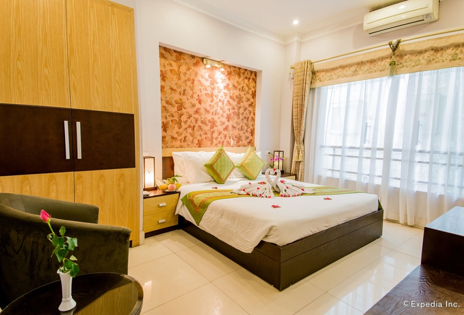 Imagen de la habitación del Hotel Serene Central. Foto 6