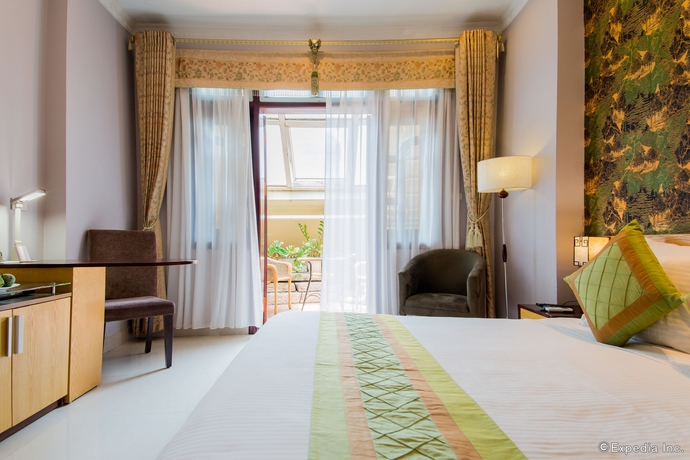 Imagen de la habitación del Hotel Serene Central. Foto 9