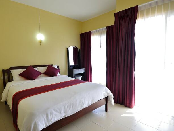 Imagen de la habitación del Hotel Serene Villa. Foto 15