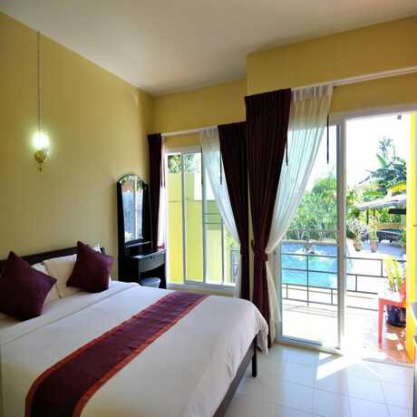 Imagen de la habitación del Hotel Serene Villa. Foto 17