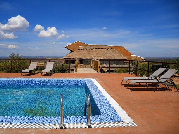 Imagen de la piscina del Hotel Serengeti Safari Lodge. Foto 19