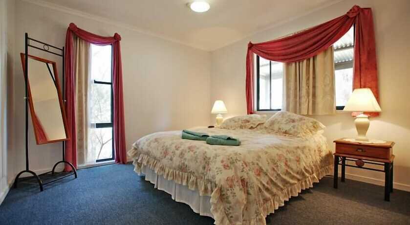 Imagen de la habitación del Hotel Serenity Grove. Foto 11