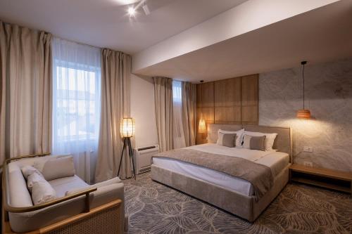 Imagen de la habitación del Hotel Serenity Timisoara. Foto 15