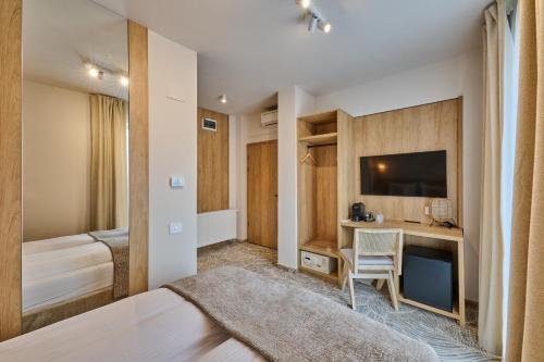 Imagen de la habitación del Hotel Serenity Timisoara. Foto 18