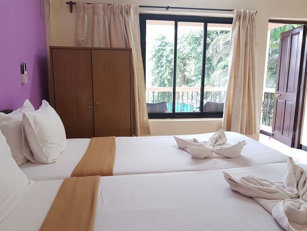 Imagen de la habitación del Hotel Serenity by the Sea Beach Resort. Foto 9