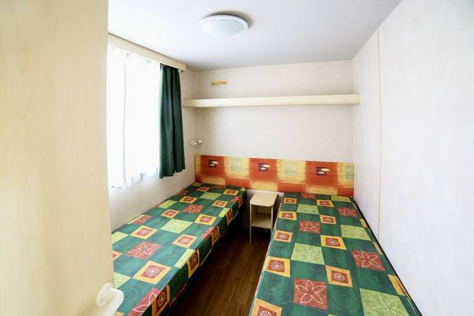 Imagen de la habitación del Hotel Sereno Camping Holiday. Foto 11