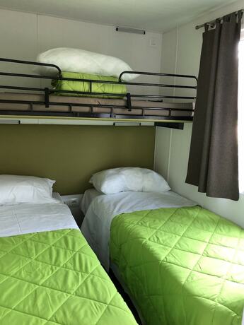 Imagen de la habitación del Hotel Sereno Camping Holiday. Foto 17