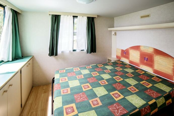 Imagen de la habitación del Hotel Sereno Camping Holiday. Foto 18