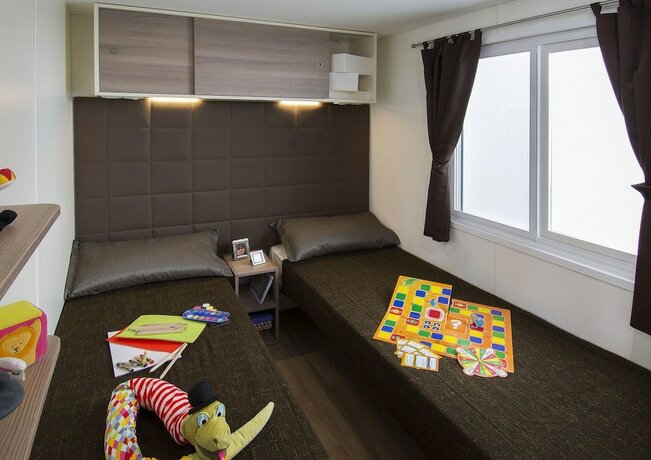 Imagen de la habitación del Hotel Sereno Camping Holiday. Foto 23