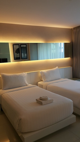 Imagen de la habitación del Hotel Serenotel Pattaya Beach Front. Foto 12