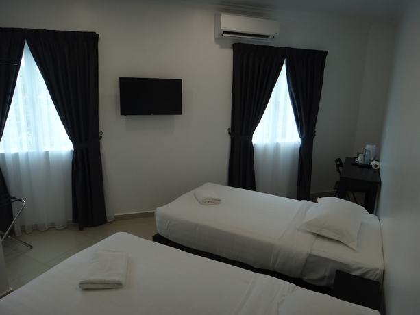 Imagen de la habitación del Hotel Seri Geliga. Foto 11