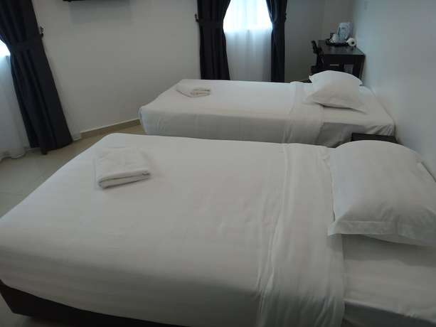 Imagen de la habitación del Hotel Seri Geliga. Foto 12