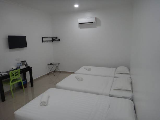 Imagen de la habitación del Hotel Seri Geliga. Foto 16