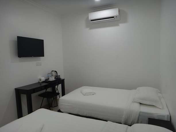 Imagen de la habitación del Hotel Seri Geliga. Foto 19