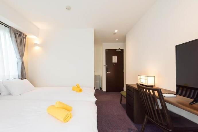 Imagen de la habitación del Hotel Serorin Light Tokyo. Foto 18