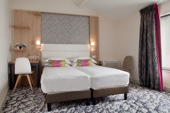 Imagen de la habitación del Hotel Serotel Suites Opera. Foto 6