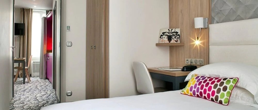 Imagen de la habitación del Hotel Serotel Suites Opera. Foto 7