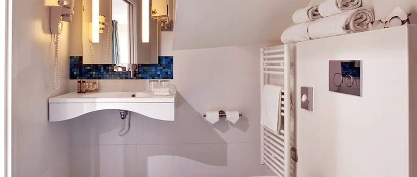 Imagen de la habitación del Hotel Serotel Suites Opera. Foto 10