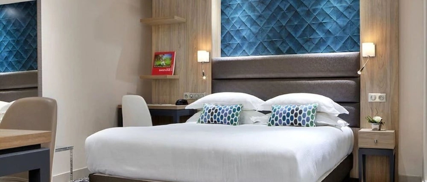 Imagen de la habitación del Hotel Serotel Suites Opera. Foto 11