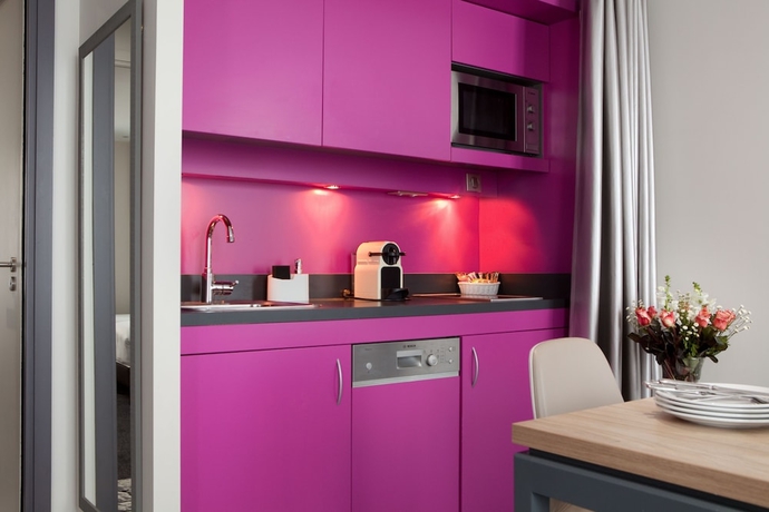 Imagen de la habitación del Hotel Serotel Suites Opera. Foto 12