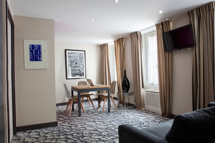 Imagen de la habitación del Hotel Serotel Suites Opera. Foto 13