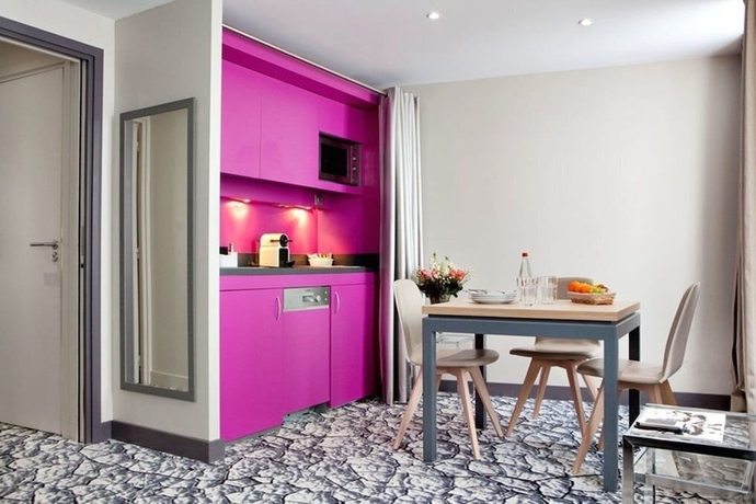 Imagen de la habitación del Hotel Serotel Suites Opera. Foto 14