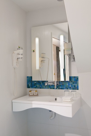 Imagen de la habitación del Hotel Serotel Suites Opera. Foto 16