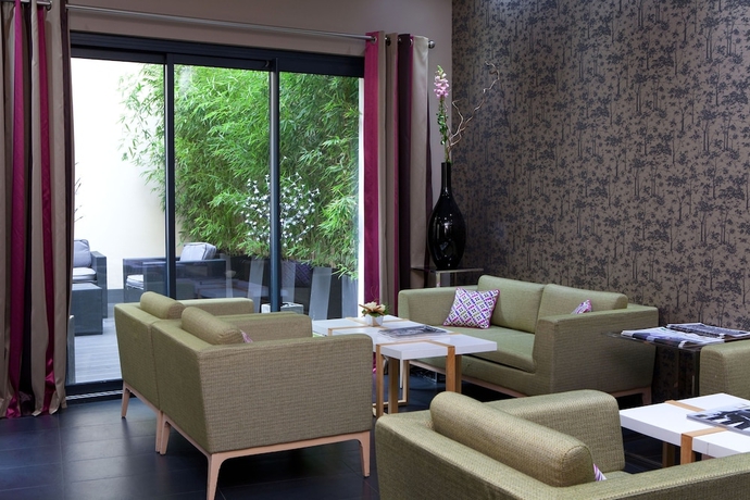 Imagen del bar/restaurante del Hotel Serotel Suites Opera. Foto 3