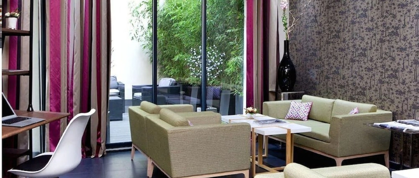 Imagen del bar/restaurante del Hotel Serotel Suites Opera. Foto 4