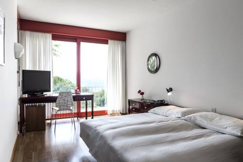 Imagen de la habitación del Hotel Serpiano Panorama Retreat. Foto 15