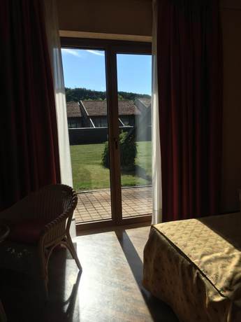 Imagen de la habitación del Hotel Serravalle Golf. Foto 12