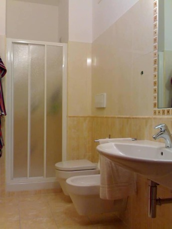 Imagen de la habitación del Hotel Sette e Mezzo. Foto 8