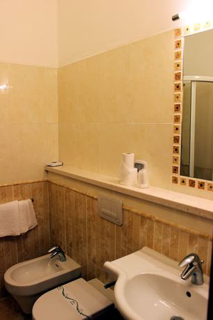 Imagen de la habitación del Hotel Sette e Mezzo. Foto 11
