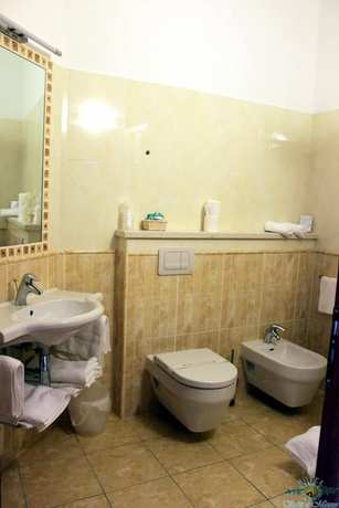 Imagen de la habitación del Hotel Sette e Mezzo. Foto 12