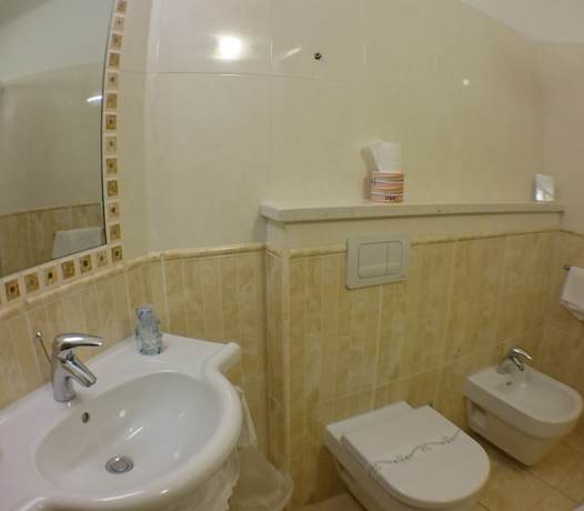 Imagen de la habitación del Hotel Sette e Mezzo. Foto 18