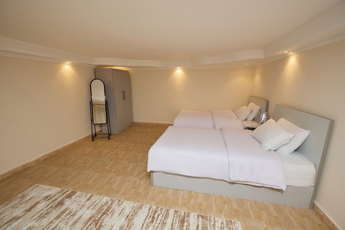 Imagen de la habitación del Hotel Settle Inn Aswar Apartments. Foto 11