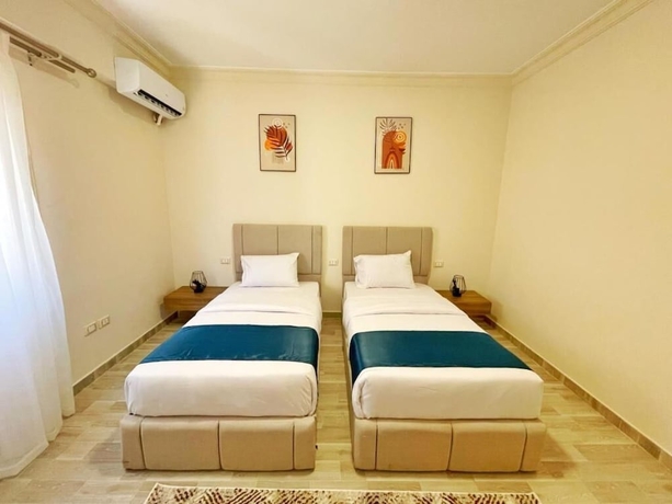 Imagen de la habitación del Hotel Settle Inn Janoub Apartments. Foto 7