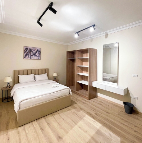 Imagen de la habitación del Hotel Settle Inn Rawda Apartments. Foto 3