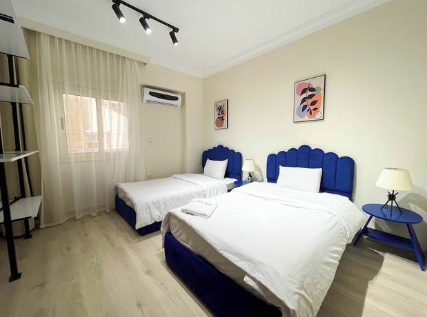 Imagen de la habitación del Hotel Settle Inn Rawda Apartments. Foto 6